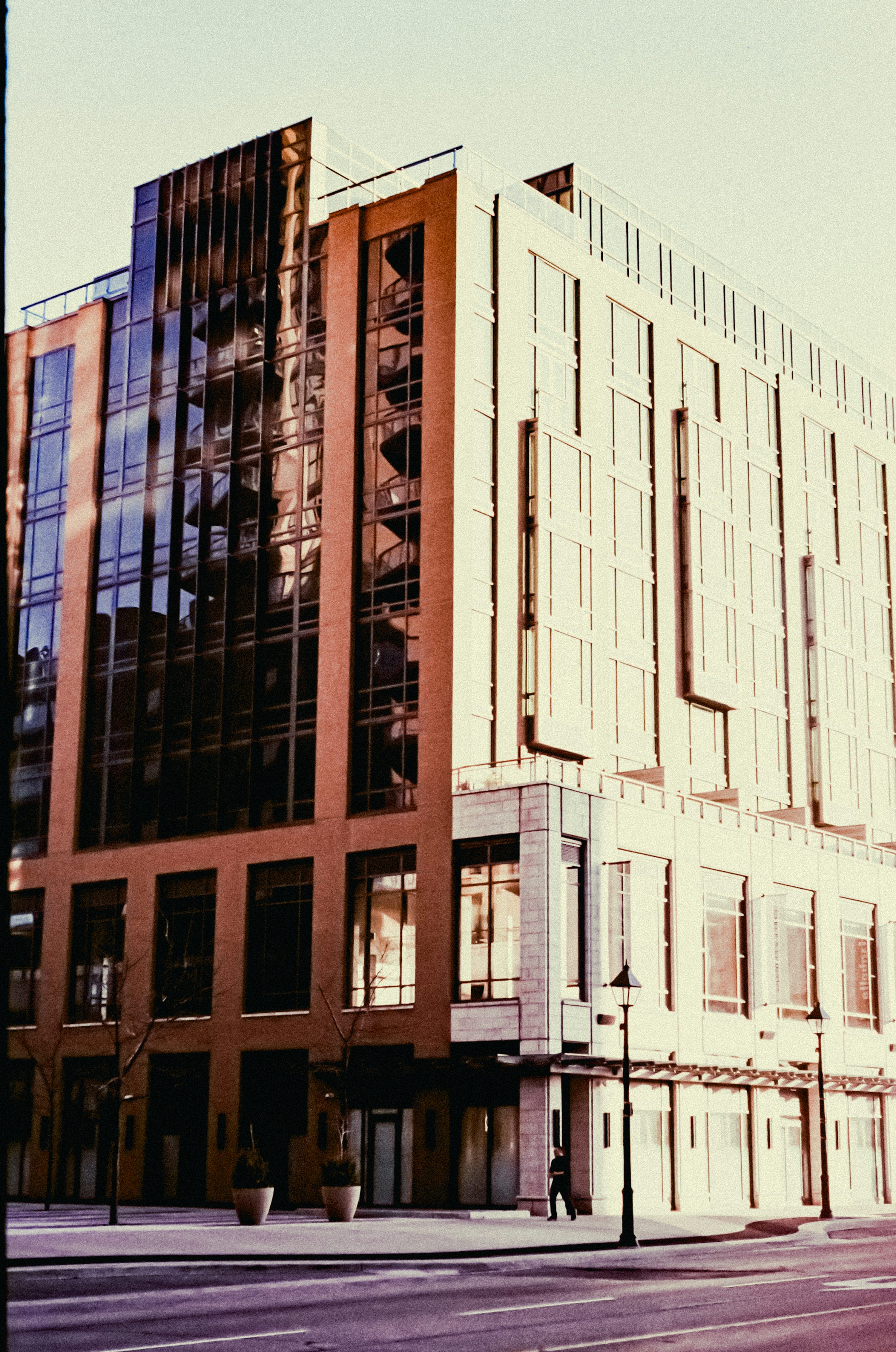 Modern commercial office building with glass and brick facade